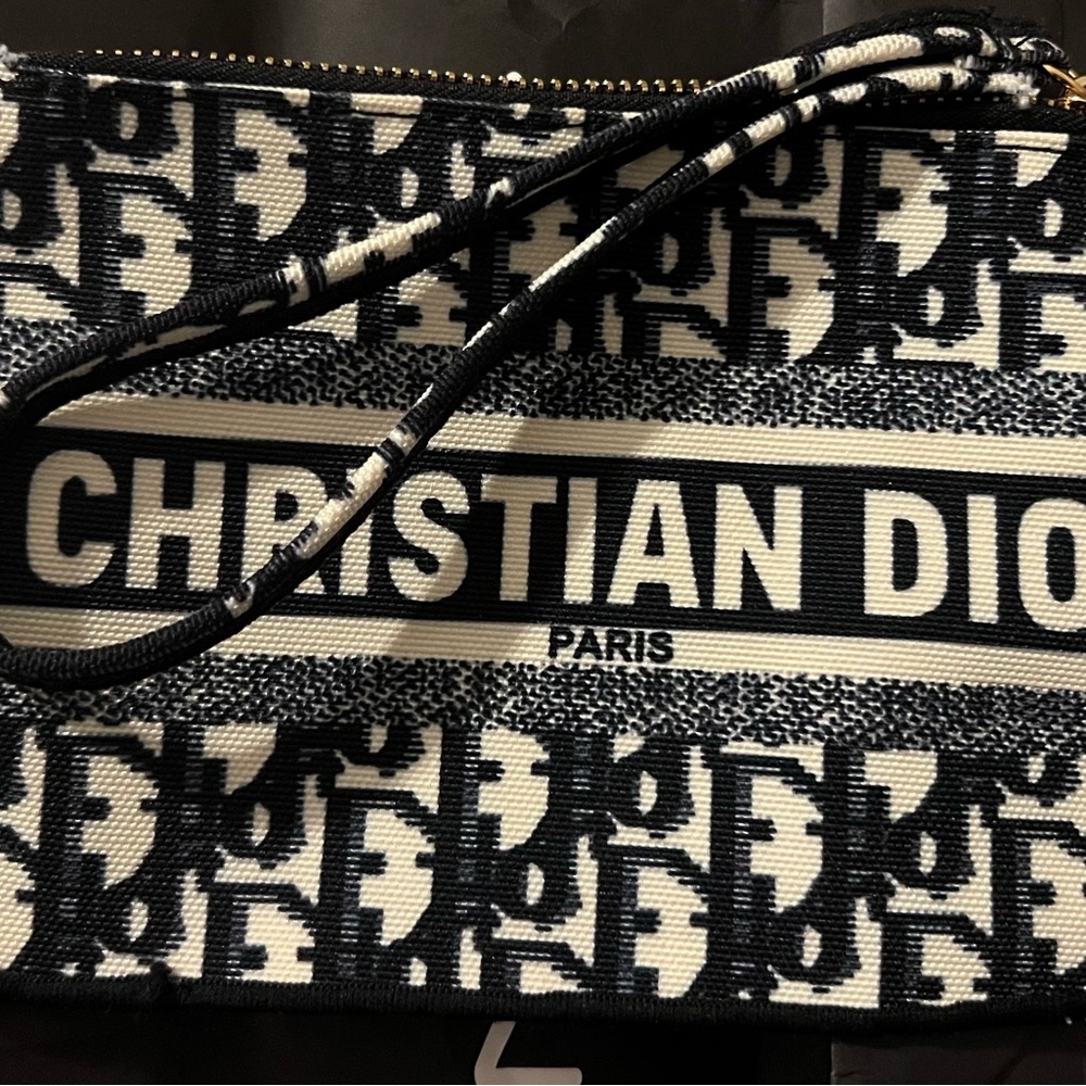 NWOT Never used. Pouche’